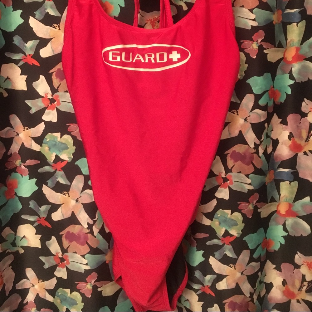 Red LIFEGUARD swimsuit.